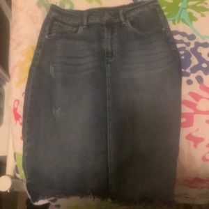 It’s a ripped slit raw Hem Denim skirt